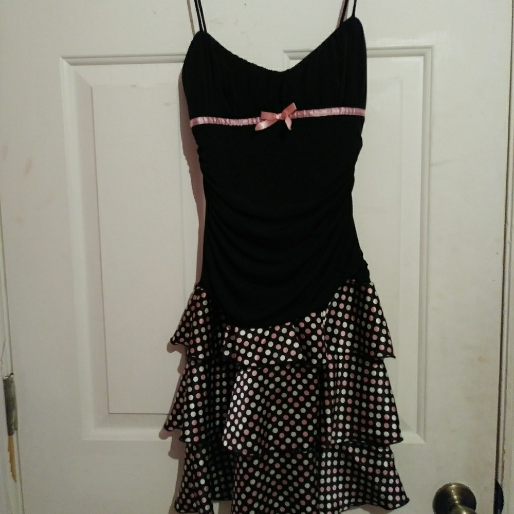 A black poka dot dress